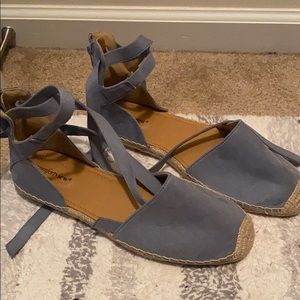 Flat shoes that wrap around the ankle